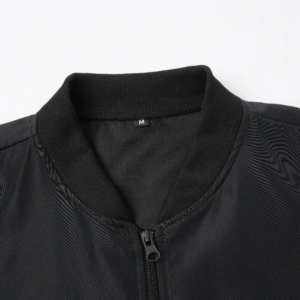 Close-up of zipper and ribbed sleeve design on men’s baseball collar coat.